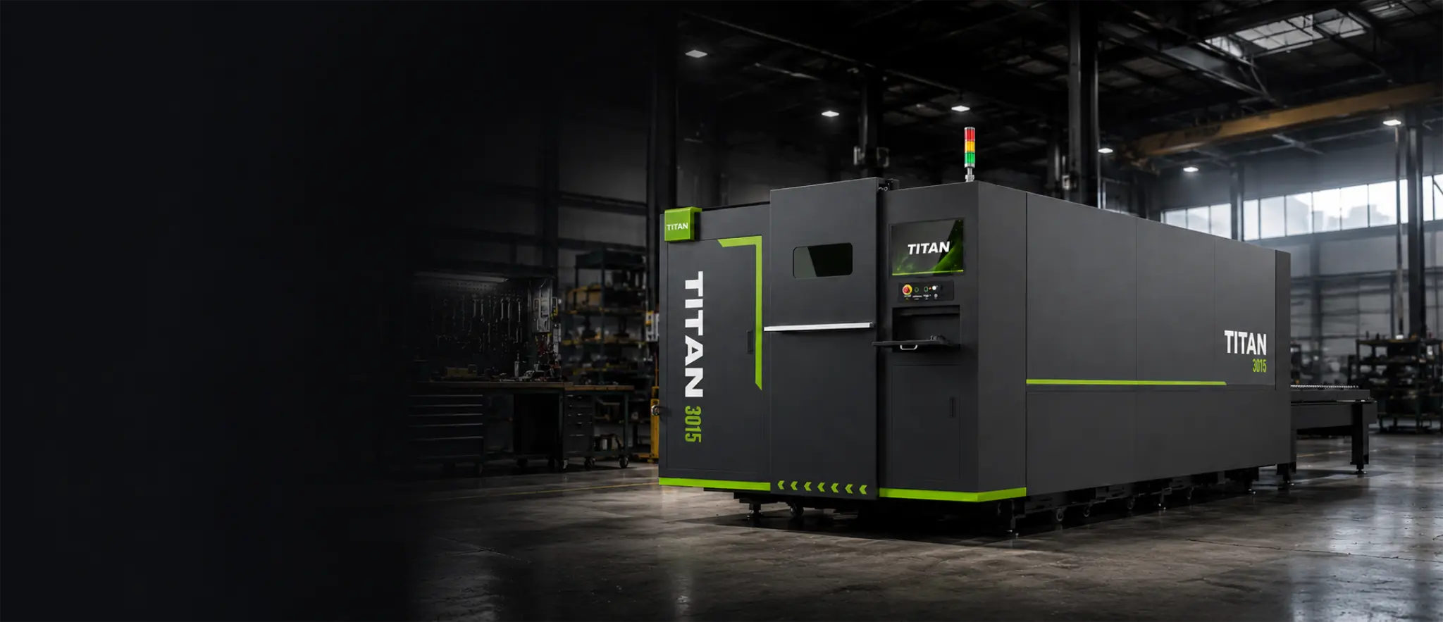 Titan F3015C dual-shuttle flatbed fibre laser supplied and installed in a UK fabrication workshop — enclosed production platform