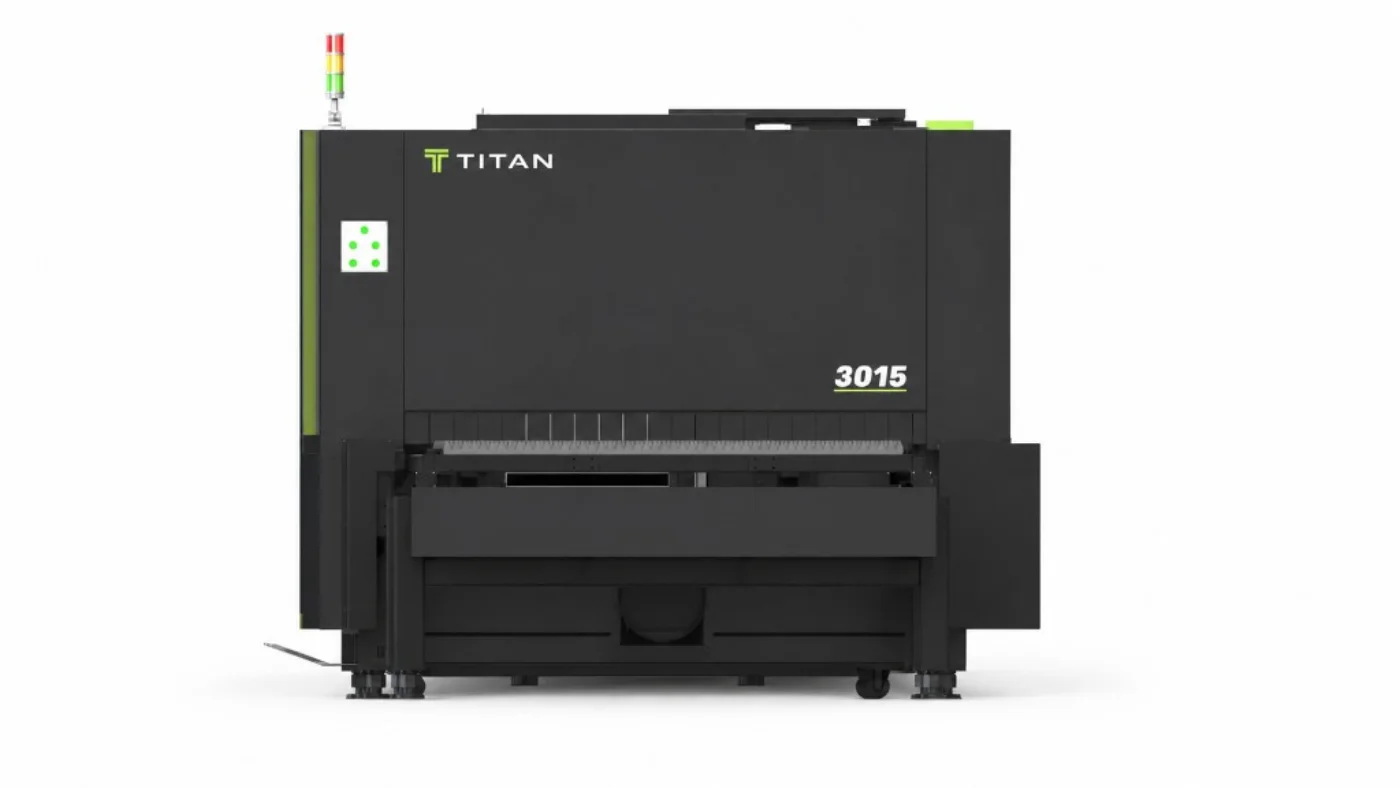 Titan F3015C dual-shuttle flatbed fibre laser — automatic table exchange for continuous production